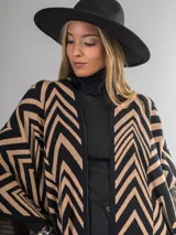 Ruana italiana con diseño zig zag en tonos negro y beige. Tejido suave y cálido.
