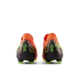 Championes de fútbol New Balance Furon V7 Pro FG, color naranja con detalles en negro y verde flúor.