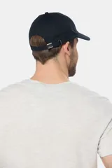 Gorro con visera azul de lona con parche frontal con logo Legacy & Co.