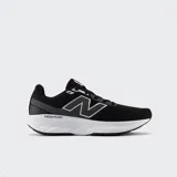 Championes de running New Balance 520, color negro con detalles en gris y entresuela blanca Fresh Foam, confeccionados con malla transpirable y material sintético.