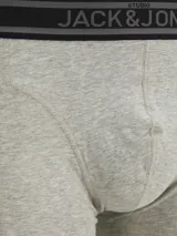 Pack de tres boxers de algodón elastizado, con cintura elástica con logo de la marca. Incluye un boxer gris melange, uno verde petróleo y uno negro.