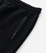 Pantalón jogger deportivo de hombre en color azul, con cintura elástica ajustable con cordón, bolsillos laterales con cierre de cremallera y bajo ajustado con puño elastizado.