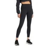 Calza deportiva negra de tiro alto, con bolsillos laterales y logo reflectivo en la pierna izquierda.