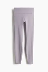 Leggings deportivas de tiro alto con cintura ancha, confeccionadas en tejido funcional SoftMove™ que ofrece suavidad y sujeción, con tecnología DryMove™ para absorción de sudor.