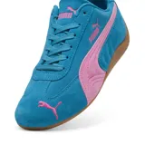 Championes Puma Speedcat OG, color azul con detalles en rosa y suela marrón.