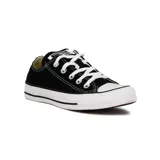 Championes Converse Chuck Taylor All Star de lona color negro con suela blanca y puntera de goma.