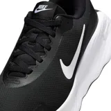 Championes Nike Promina de running, color negro con logo lateral en blanco y suela de plataforma blanca con diseño estriado.