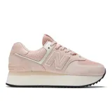 Championes New Balance Icon 574 color rosa con detalles en blanco, confeccionados en gamuza y malla, con logo "N" característico en los laterales y plataforma blanca.