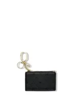 Billetera y tarjetero negro de textura granulada con llavero integrado, bolsillo superior con cremallera y ventana exterior transparente para identificación.
