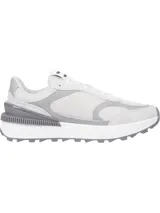 Zapatillas Tommy Jeans blancas y grises con detalles en rojo y azul. Presentan el logo de Tommy Jeans en el lateral y suela dentada. Confeccionadas con poliéster reciclado.