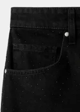 Jeans de tiro bajo color negro, con diseño wide leg y cinco bolsillos.