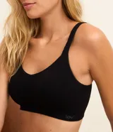 Soutien top de microfibra color lila, sin relleno, con textura acanalada y detalles de trenzas, de tirantes finos.