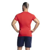 Remera deportiva azul marino de manga corta, corte ajustado y logo de Umbro estampado en el pecho.