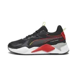 Championes Puma RS-X-3D negros con detalles en rojo, amarillo y blanco. Confeccionados en mesh y material sintético, con entresuela de PU y suela de goma.