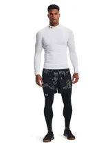 Remera térmica de compresión Under Armour con cuello alto, manga larga y diseño ergonómico. Confeccionada en tejido de doble capa con interior cepillado y paneles de malla elástica para ventilación estratégica.