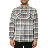 Camisa de franela a cuadros color blanco, gris y ocre, de manga larga, con cuello clásico, cierre frontal con botones y dos bolsillos con solapa abotonada en el pecho.