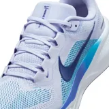 Championes de running Nike Air Zoom Pegasus 41, con diseño aerodinámico en tonos celestes y azules, suela blanca con tecnología de amortiguación y logo lateral en azul oscuro.