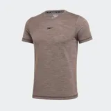 Remera deportiva color marrón con logo Reebok Vector en el pecho.