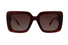 Lentes de sol Azzaro con armazón de acetato en tono carey y cristales polarizados en color marrón.