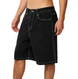 Bermuda de denim Rip Curl modelo Nu Dose Denim Walk 22", color negro con costuras en contraste de color blanco. Presenta bolsillos laterales tipo carpintero y presillas para cinturón.