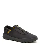 Championes Caterpillar modelo Hex Canvas, color negro con detalles en amarillo. Presentan un diseño minimalista con suela de goma gruesa con textura hexagonal y logo de la marca en el lateral y la lengüeta.