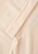 Jersey de punto fino con cuello alto y manga larga, de diseño recto y corte clásico.