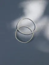 Pulsera elástica de cuentas de 3mm en oro laminado 14 kilates.