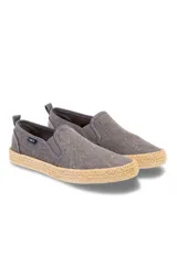 Zapatillas Legacy grises sin cordones, con elástico en los laterales y suela de yute.