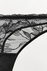 Tanga negro de tiro medio, confeccionado en tejido mesh con bordados florales a tono y cintura elástica.
