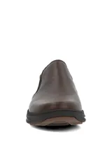 Zapatos slip on Hush Puppies modelo Hunt II, color marrón, confeccionados en cuero con elásticos laterales para un calce fácil y suela ultraliviana.