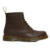 Botas de cuero estilo militar con cordones, modelo 1460 de Dr. Martens. Presentan un acabado en cuero Crazy Horse de aspecto envejecido, costuras amarillas características en la vira y suela de goma AirWair resistente.
