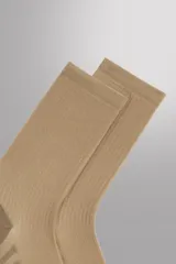 Pack de dos pares de calcetines de entrenamiento de caña media, confeccionados en tejido elástico con acabado acanalado.