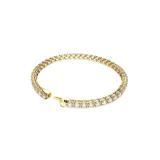Pulsera dorada con cristales blancos engarzados.