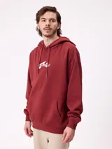 Canguro color bordó con capucha ajustable mediante cordones, bolsillo canguro frontal y puños y dobladillo acanalados. Presenta el logo de la marca Rusty en blanco en el pecho.