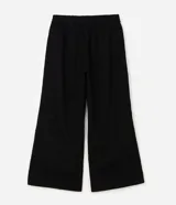 Pantalón pantalona negro de algodón, de corte amplio y cómodo con cintura elástica. Presenta franjas laterales a contratono de diseño deportivo.