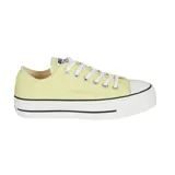 Championes Converse Chuck Taylor All Star Lift, color amarillo pastel, con plataforma blanca y detalles en negro.