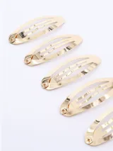 Set de seis hebillas doradas para el pelo, tipo sapitos.