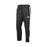 Pantalón deportivo Nike de corte ajustado, color negro con franjas laterales blancas. Cuenta con cintura elástica con cordón de ajuste, bolsillos laterales con cierre y logo de la marca estampado en el muslo.