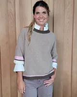 Sweater celeste de lana lambswool con cuello redondo y mangas 3/4.