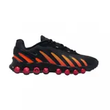 Championes Nike Air Max Dn8 de diseño deportivo, color negro con detalles degradados en naranja y suela con cápsulas de aire rojas.