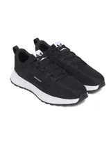 Championes Under Armour modelo Street Mirage, color negro con entresuela blanca. Presentan una parte superior de malla transpirable con superposiciones de gamuza, cierre de cordones y suela de goma duradera.