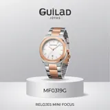 Reloj analógico Mini Focus con movimiento de cuarzo japonés, caja de aleación metálica y malla de acero inoxidable bicolor en tonos plata y oro rosa. Presenta una esfera blanca minimalista con indicadores de hora lineales y ventana de fecha.