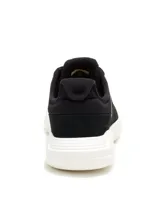 Sneakers Caterpillar modelo Hex Lite Qt, color negro con suela chunky blanca, confeccionadas en gamuza con detalles sintéticos y cordones negros.