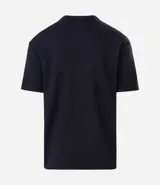 Remera masculina de algodón y poliéster, color verde claro, con cuello redondo, manga corta y corte relajado. Presenta una textura de mini waffle.