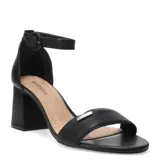 Sandalias de cuero negro con taco cuadrado medio, puntera abierta y tira con hebilla ajustable en el tobillo. Presenta una placa metálica decorativa en la tira delantera.