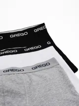 Pack de tres boxers de algodón con cintura elástica personalizada con el logo de la marca. Incluye un boxer negro, uno blanco y uno gris melange.