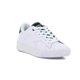 Championes urbanos Diadora modelo Set, color blanco con plataforma. Presenta detalles en verde y negro en el forro interior y cordones.