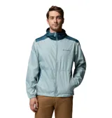 Campera cortavientos Columbia Flashback II en color celeste con capucha y detalles en azul oscuro en hombros y laterales. Cuenta con cierre frontal completo y bolsillos laterales.
