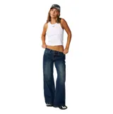 Pantalón de jean Rip Curl modelo Archive Baggy Low Rise, de tiro bajo y corte ancho, color azul con efecto deslavado.