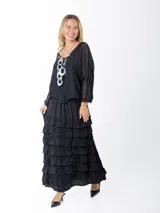 Blusa color gris claro de seda italiana, talle único oversized, con forro elastizado, mangas 3/4 y escote en V.